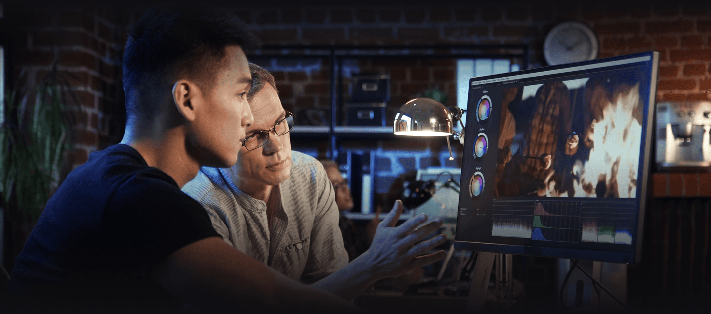 Software developers working on a laptop